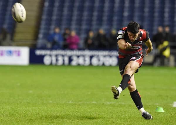 Edinburgh's Sam Hidalgo-Clyne kicks a late penalty. Picture: Gary Hutchison/SNS/SRU