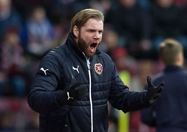 Robbie Neilson encourages his team during the 1-0 win over Partick. Pic: John Devlin
