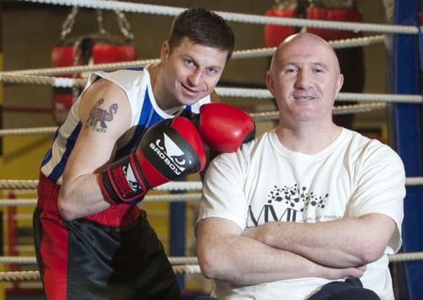 Amateur boxer Ross Love is fighting to help friend Murray Muir. Picture: Lesley Martin
