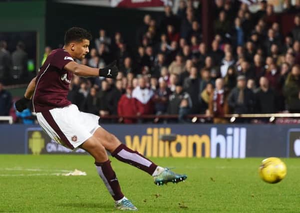 Osman Sow strikes home his late equaliser against Celtic
