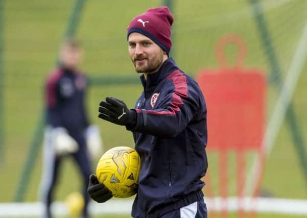 Perry Kitchen gets involved in Hearts training. Pic: SNS