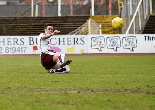 Jamie Walker nets Hearts' winner at Dundee. Pic: SNS