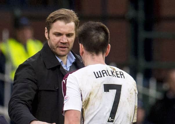 Hearts boss Robbie Neilson congratulates Jamie Walker on another fine performance. Pic: SNS