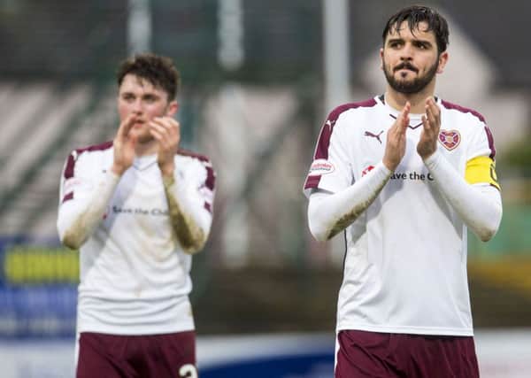 John Souttar, left, and Alim Ozturk have been rock-solid at the heart of the Jambos' defence. Pic: SNS