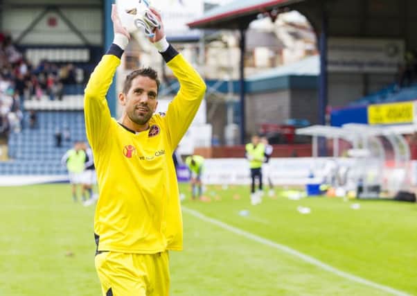 The Hearts keeper Neil Alexander is overjoyed at Dundee. Pic: SNS