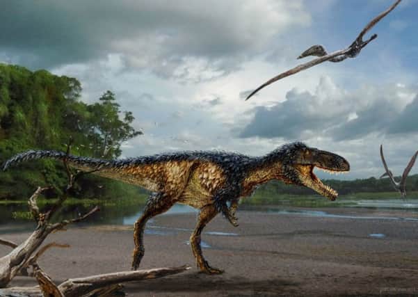 An artist's impression of Timurlengia euotica, the newly discovered dinosaur which scientists claim may be a forerunner of the T-Rex. Picture: SWNS