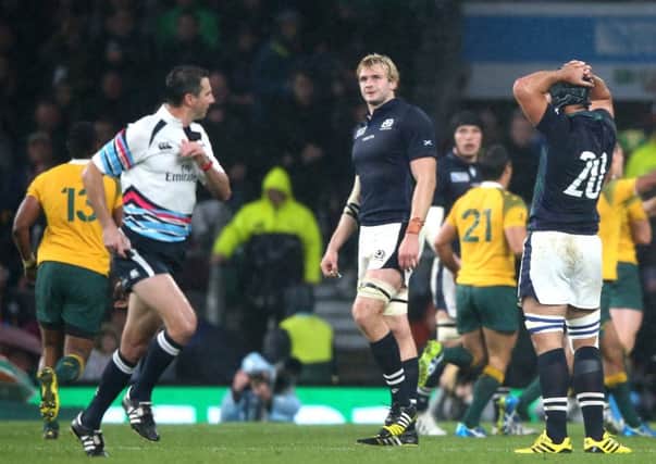 Craig Joubert ran off the Twickenham pitch after his controversial penalty decision   much to the annoyance of Greig Laidlaw, below, and his team-mates