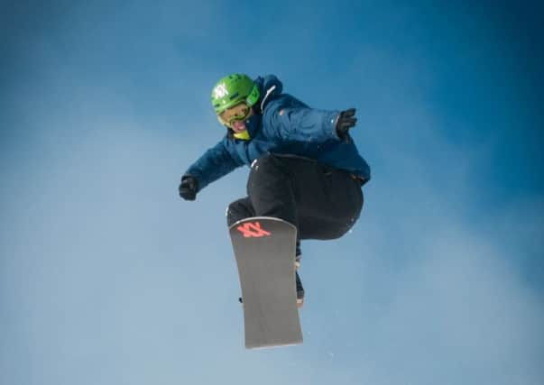 Snowboarder Kyle Wise in action at Glenshee, where he became Scottish champion for a second successive year. Pic: Steve McKenna