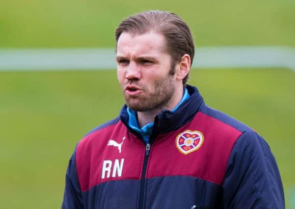 Hearts head coach Robbie Neilson is looking at strikers all the time