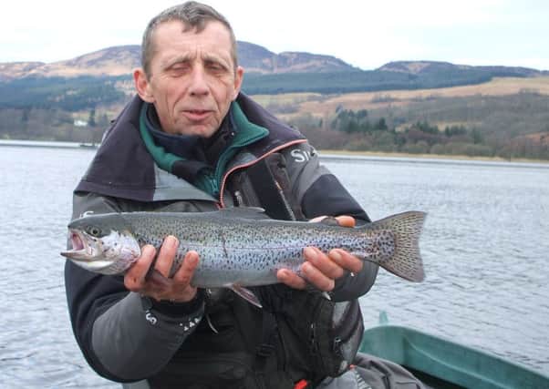 Willie Brash of Mayfield with a 2lb rainbow taken on a Cormorant at Lake of Menteith