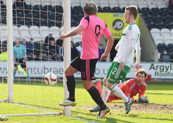 Hibs' Jason Cummings nets for Scotland Under-21s. Pic: SNS