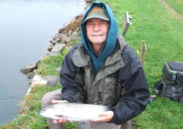 John Tennent of Mayfield with a 3lb rainbow taken on a Humungus at Markle