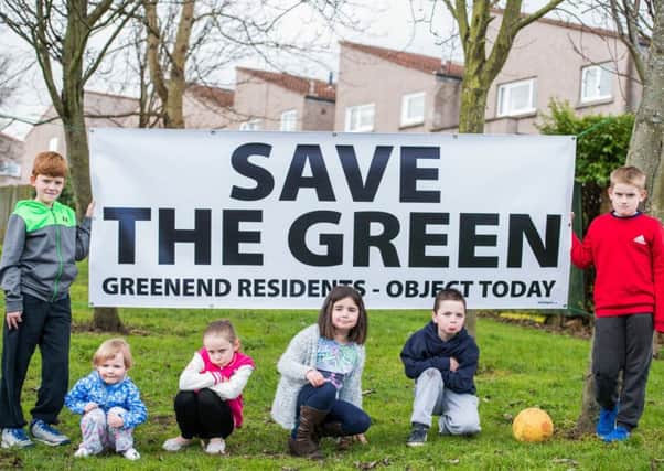 Greenend residents protest against plans to build houses on their estate. Picture: Ian Georgeson