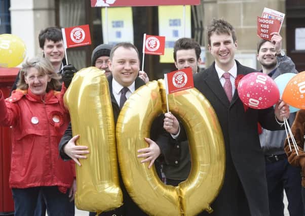Ian Murray with Daniel Johnson, MSP candidate for Edinburgh South, celebrating 10 years of free bus travel for over 60s. Picture: Greg Macvean