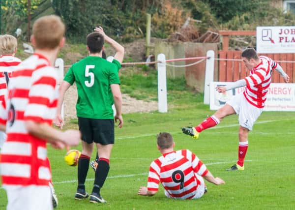 Ross Archibald strikes home the opener. Picture: Ian Georgeson