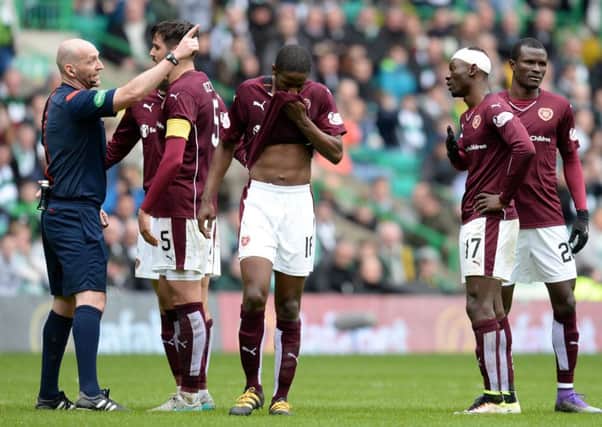 Hearts' Juwon Oshaniwa, second from right, is sent off by referee Bobby Madden