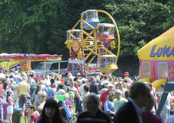 Crowds gather around the rides at Corstorphine Fair. Picture: Julie Bull