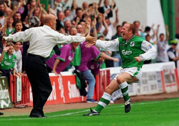 Chic Charnley celebrates with Jim Duffy after scoring from his own half against Alloa. Picture: TSPL