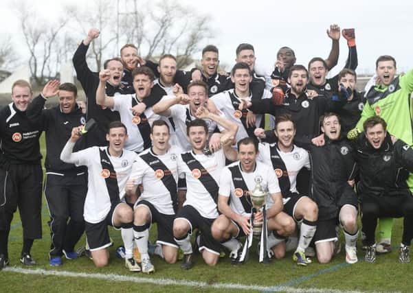The Edinnburgh City squad celebrate another Lowland League title. Pic: Greg Macvean