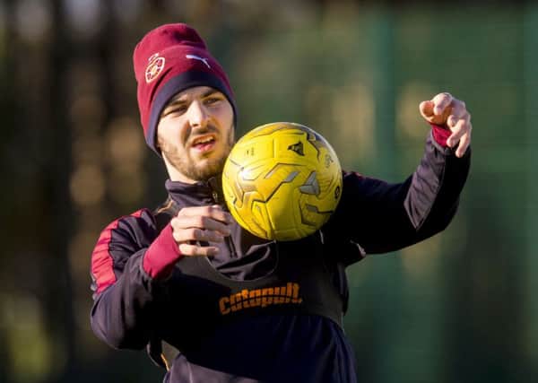 Hearts' Callum Paterson is put through his paces at training