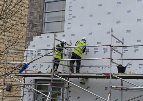 Work is carried out on Oxgangs Primary School. Picture: Julie Bull