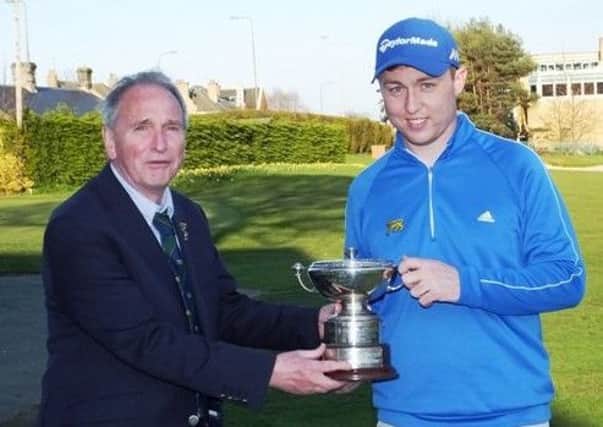 This years Craigmillar Park Open winner Graeme Robertson with club captain George Hunter