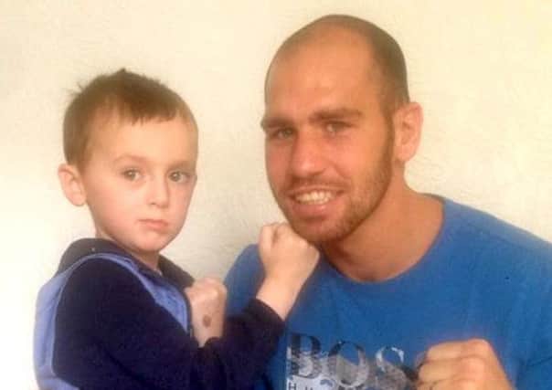Jayden Nicol with boxer Stephen Simmons. Picture: supplied