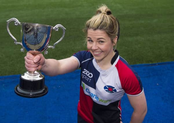 Murrayfield Wanderers captain Lisa Martin with the Sarah Beaney Cup