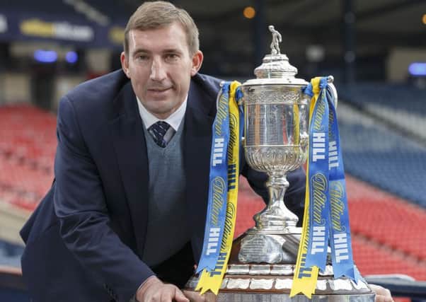 Alan Stubbs takes Hibs back to Hampden tomorrow to face Dundee United. Pic: Steve Welsh