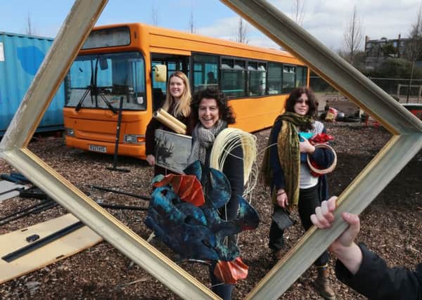 Antonia Dickson from the Edinburgh Scrap Store, Emma Roy of Lothian Buses and Denise Havard from EDI get to work at the bus. Picture: Stewart Attwood