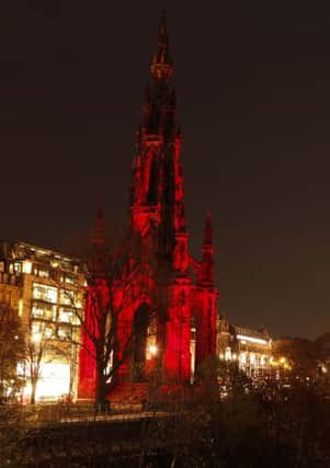 The Scott Monument illuminiated in red for Poppy Day. Picture: Toby Williams