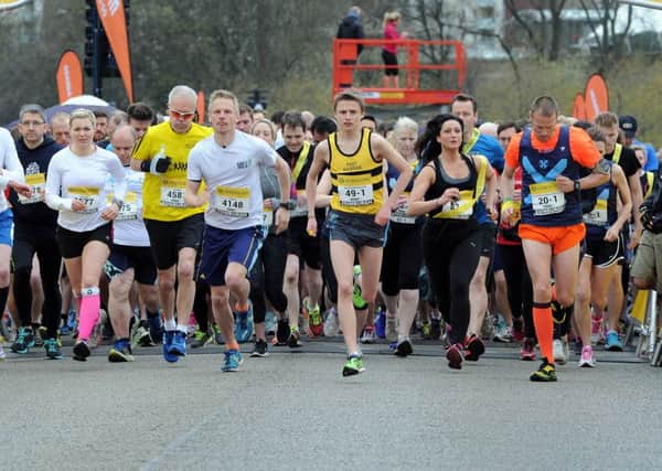 Runners cross the starting line. Picture: Lisa Ferguson