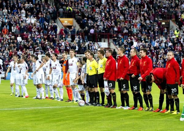Hearts and Liverpool line up at Tynecastle in the first leg of their Europa League tie in August 2012