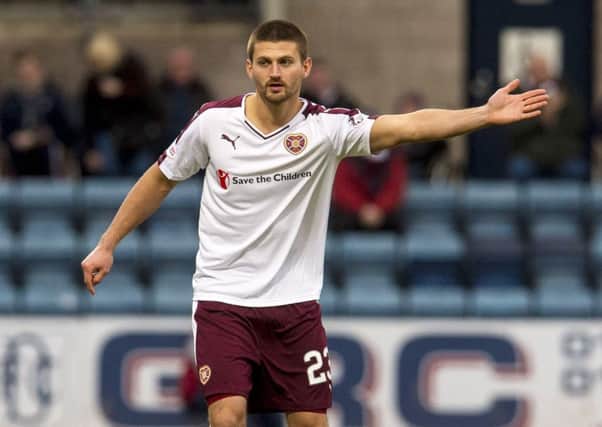 Perry Kitchen hasn't looked back since making his Hearts debut against Dundee last month. Pic: SNS
