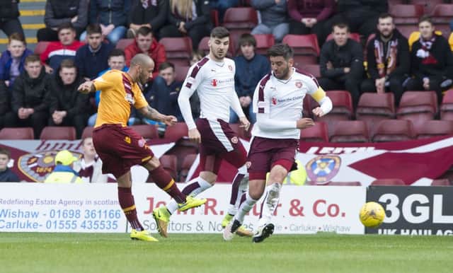 Motherwell's Lionel Ainswirth makes it 1-0. Picture: SNS