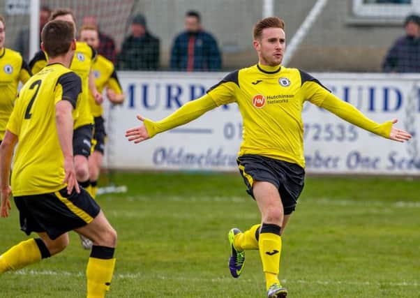 Ross Allum celebrates his opener as Edinburgh City won 3-0 in the first leg of their clash with Cove. Pic: Jasperimage