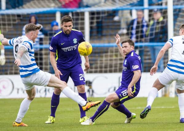 Hibs found the going tough against a resolute Morton side. Pic: SNS