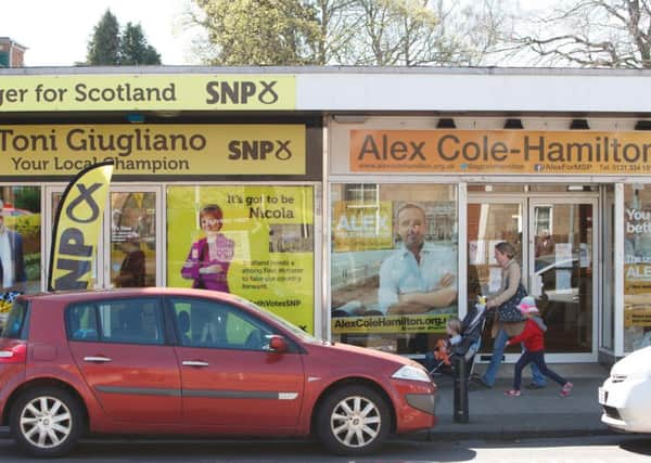 The campaign  offices of candidates Toni Giugliano and Alex Cole-Hamilton are next door to each other on St John's Road. Picture: Toby Williams