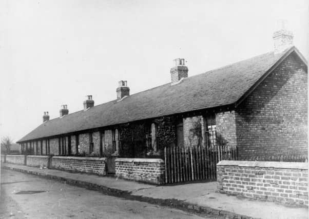 Terrace of miners houses at Newtongrange c.1920s. Photo: Scran/National Museums Scotland