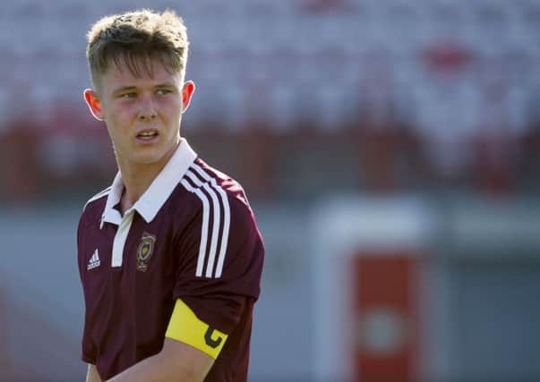 Angus Beith is glad to have a second bite at the Scottish Youth Cup after losing the final two years ago against Rangers in heart-breaking fashion, below