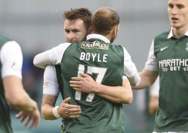 James Keatings celebrates with team-mate Martin Boyle after scoring the second of his three goals against Dumbarton last night. Pic: Greg Macvean