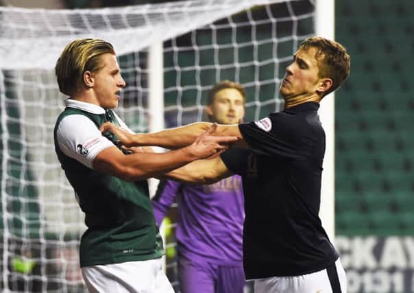Hibs and Falkirk are neck-and-neck in the race for second spot in the Championship. Pic: SNS