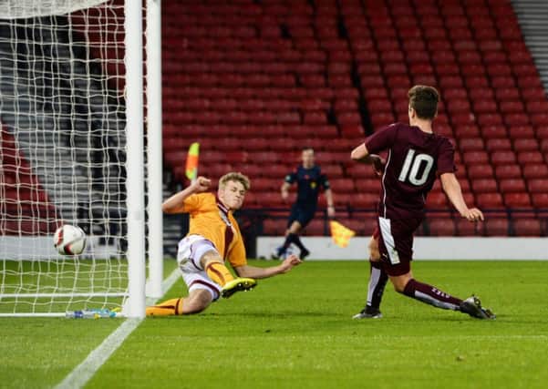Hearts' Dario Zanatta (10) scores his side's second to bring hope at 3-2, but it was quickly snuffed out