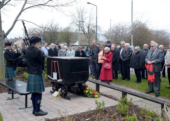 A plaque listing the names of men and women who died in mining accidents at Woolmet Colliery was unveiled at the Miners' Memorial in Danderhall