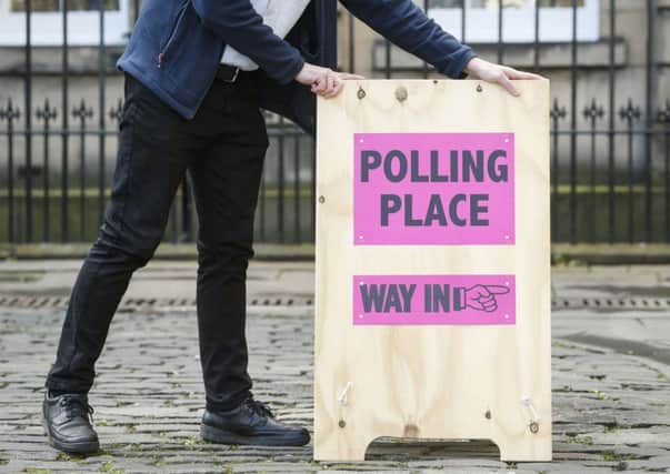 Council staff deliver signage and materials for set-up of the Lothian Chamber polling station ahead of tomorrow's election. Picture: Danny Lawson/PA Wire