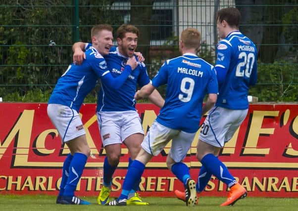 Stranraer's Andrew Stirling, second from left, celebrates after he put his side 2-1 ahead