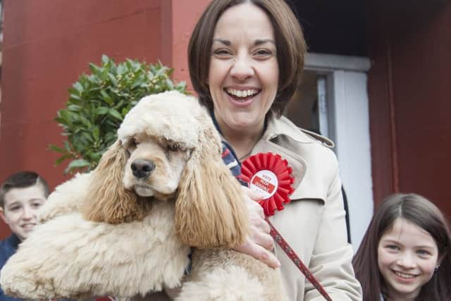 Kezia Dugdale MSP, Scottish Labour Leader, with American Spaniel Gracie as she officially opens her campaign shop in Edinburgh Eastern.