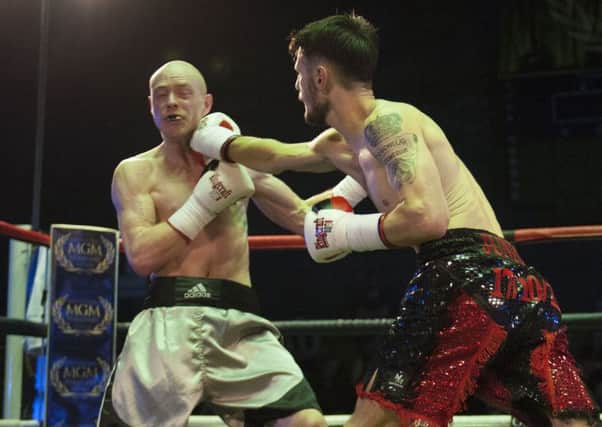 Jason Easton lands a right hand on Nathan Hardy