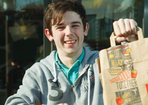 Robert Aiken handed out free McDonald's food to the city's homeless. Picture: Toby Williams