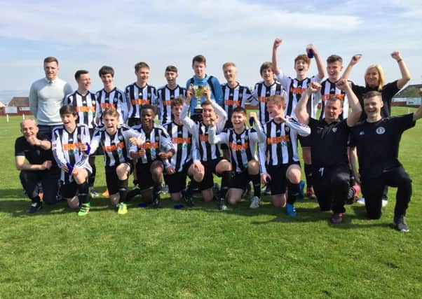 Dalkeith Miners 16s celebrate their victory at New Dundas Park